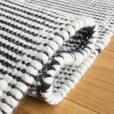 Marbella Black and Ivory Flat Woven Wool Area Rug