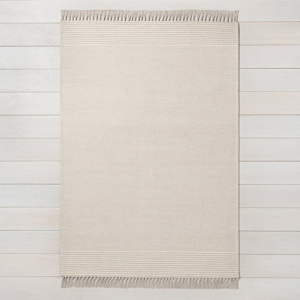 5' x 7' Textured Border Stripe Area Rug Twilight Taupe - Hearth & Hand™ with Magnolia