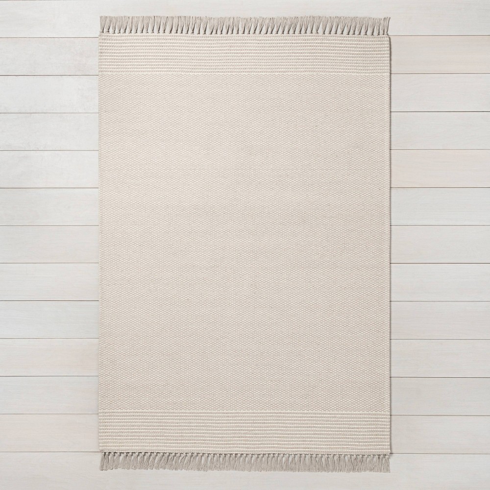 5' x 7' Textured Border Stripe Area Rug Twilight Taupe - Hearth & Hand™ with Magnolia