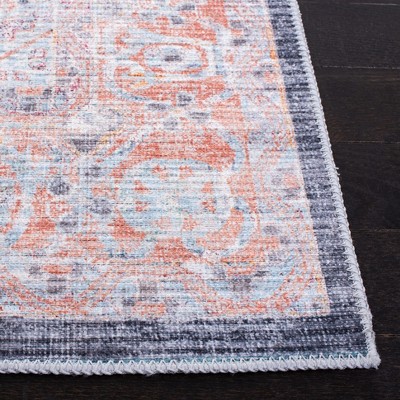 Serapi 6'7" x 9' Blue and Terracotta Washable Area Rug