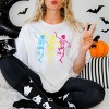 Simply Sage Market Three Skeletons Dancing Neon Garment Dyed Tee - 2 of 4
