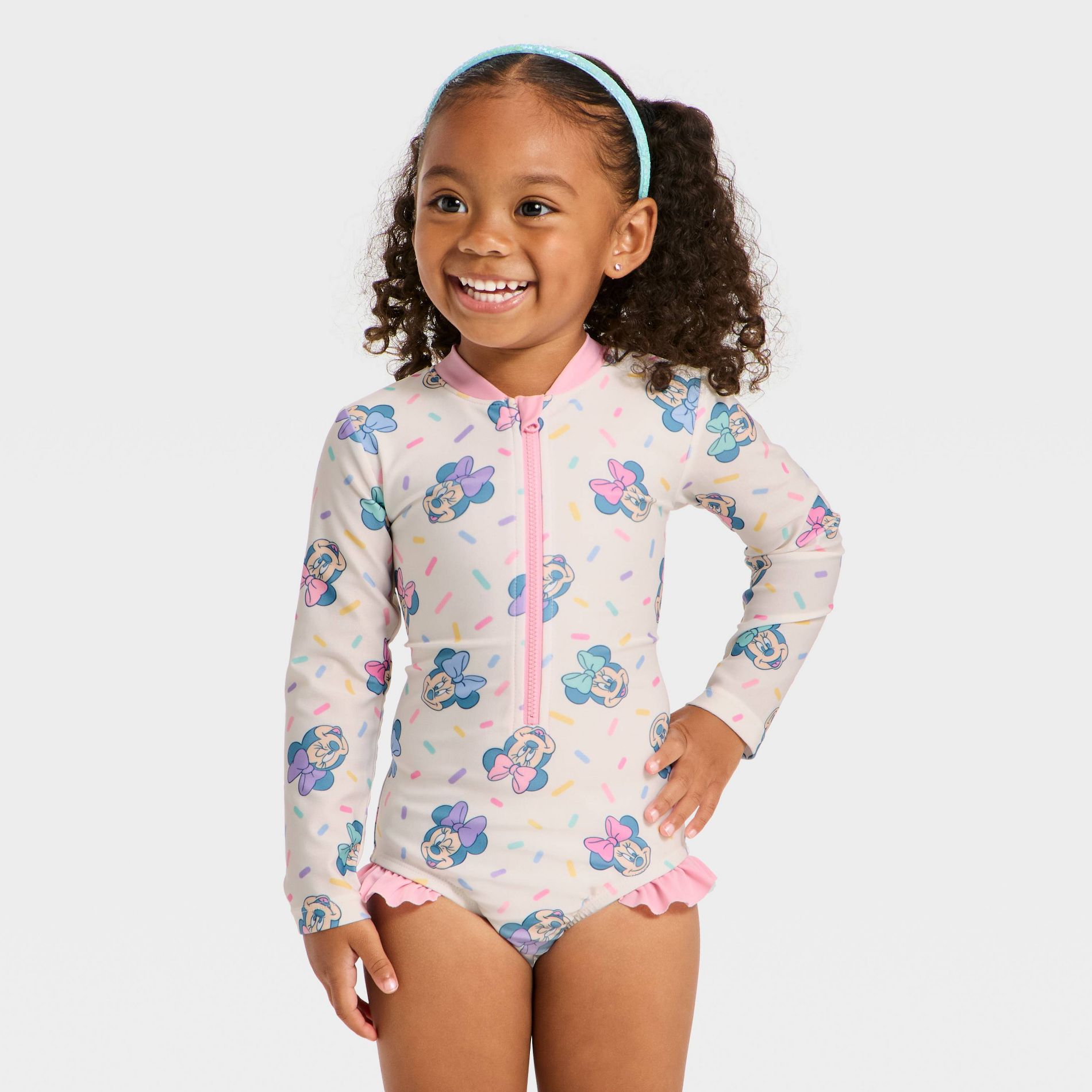 Toddler Girls' Disney Long Sleeve Minnie Mouse Sprinkle Printed One Piece Rash Guard - White