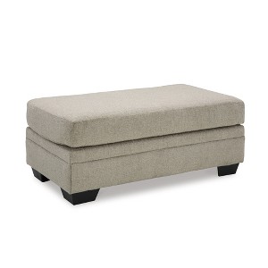 Signature Design by Ashley Stonemeade Upholstered Ottoman, Taupe Brown - 1 of 4