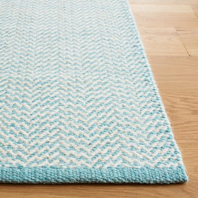 Teal and Ivory Hand-Knotted Wool 8' x 10' Area Rug