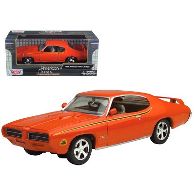 1969 Pontiac GTO Judge Orange with Stripes 1/24 Diecast Model Car by Motormax