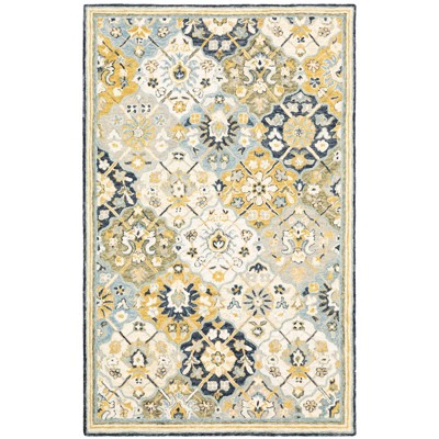 Oriental Weavers Alfresco 28406 Blue/ Gold Indoor Area Rug - 3'6" x 5'6"