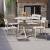 WestinTrends Playa Modern 5-Piece Resin Round Patio Dining Table Set with Stackable Patio Dining Chairs - 2 of 4