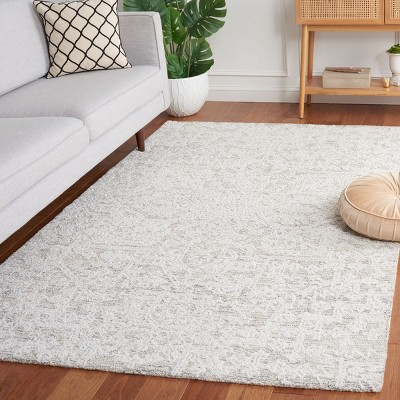 Ivory and Silver 6' x 9' Hand-Tufted Wool Area Rug