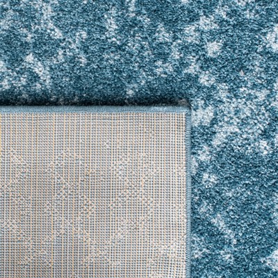 Turquoise Blue Synthetic Rectangular Boho Area Rug 5'3" x 7'6"