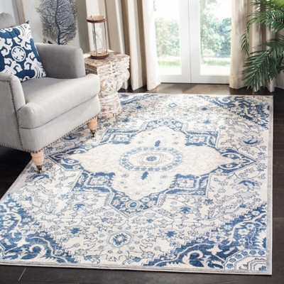 Brentwood 4' x 6' Blue and Cream Synthetic Area Rug