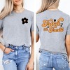 Simply Sage Market Women's Trick or Treat Flowers Front and Back Short Sleeve Graphic Tee - 2 of 4