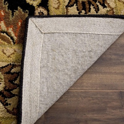 Handmade Black and Ivory Tufted Wool Area Rug