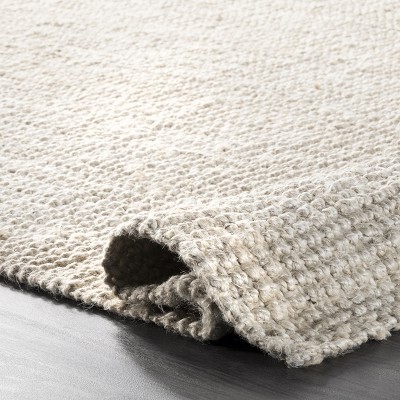 Kiwa Handwoven Off-White Jute 5' x 8' Area Rug