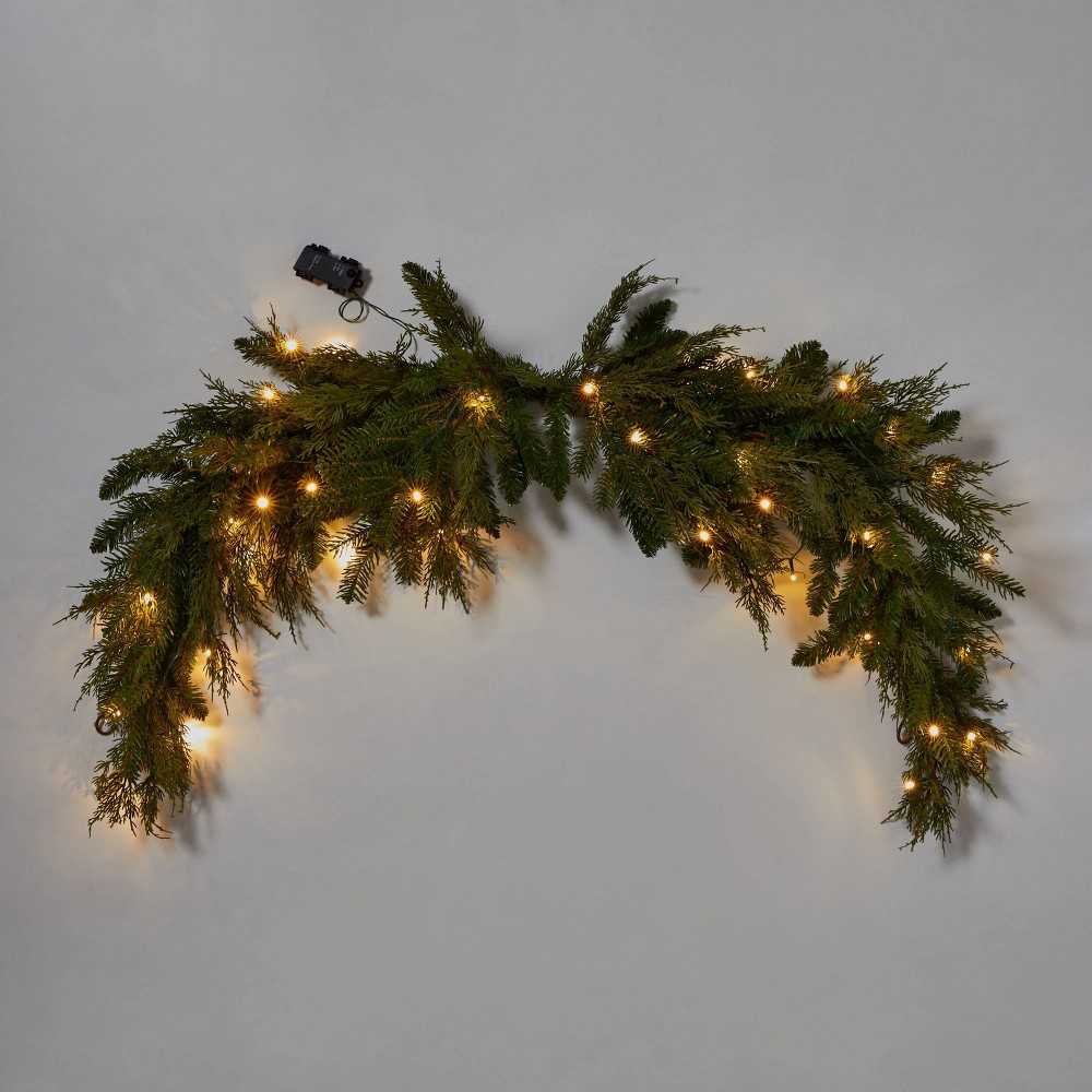 6' Battery Operated Pre-Lit Mixed Greenery & Cedar Artificial Christmas Door Swag Warm White LED Lights - Wondershop