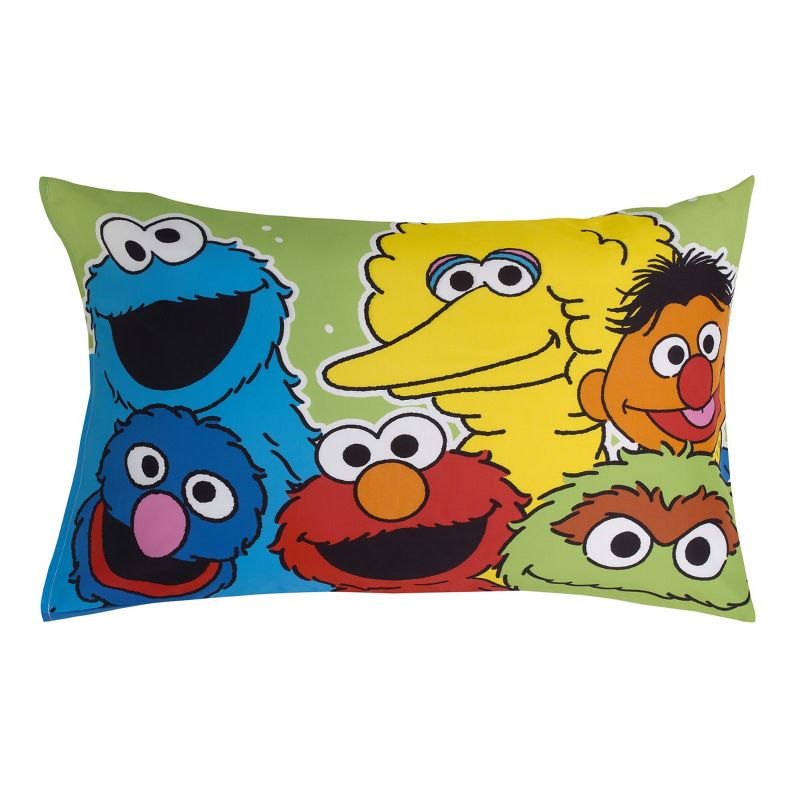 Sesame Street Come and Play Blue, Green, Red and Yellow 2 Piece Toddler Sheet Set - Fitted Bottom Sheet and Reversible Pillowcase, 4 of 7