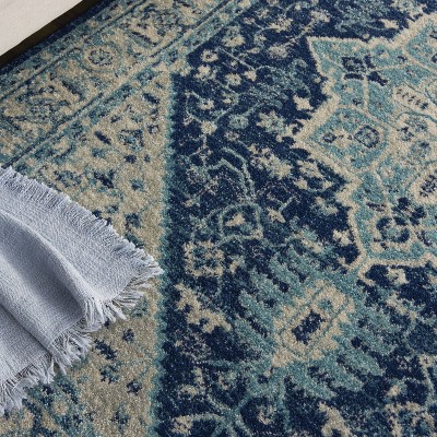 Ivory and Navy Synthetic 5' x 7' Rectangular Area Rug