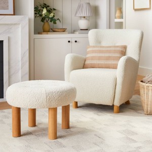 Kessler Round Tufted Faux Shearling Ottoman with Wood Legs Cream - Threshold™ designed with Studio McGee - 1 of 4