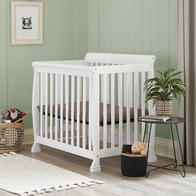 White Wooden 4-in-1 Convertible Mini Crib and Dresser Set
