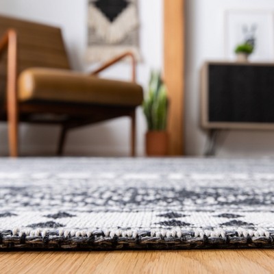 Augustine Black and Cream Geometric Flat Woven Area Rug