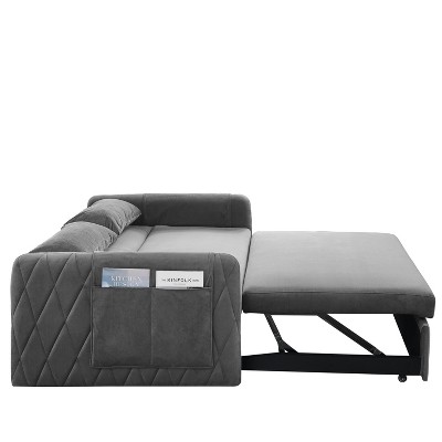 Side view of grey velvet sofa bed showing quilted sides and metal frame support under extended section