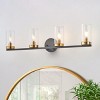 Modern 4-Light Vanity Light Fixture, Black and Gold Bathroom Wall Sconce with Seeded Glass Shades - 2 of 4