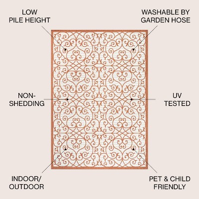 Cream and Orange 8' x 10' Synthetic Flat Woven Reversible Rug