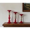 HomeRoots Set of Three Red And Natural Ornate Resin Tabletop Pillar Candle Holders - 2 of 4