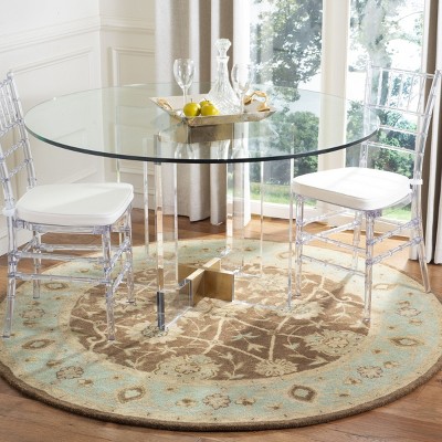 Handmade Tufted Ivory and Brown Wool Round Rug