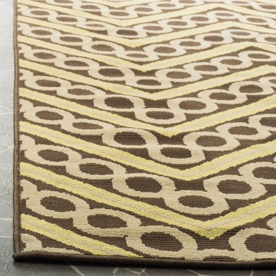 Hampton Brown and Ivory Chevron Synthetic Indoor/Outdoor Rug