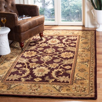 Handmade Round Dark Plum and Gold Wool Tufted Rug