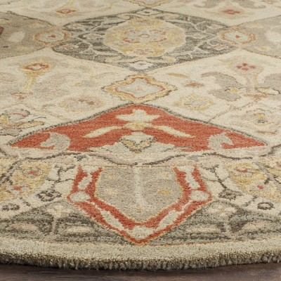 Antiquity Handmade Oval Red Wool Area Rug