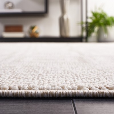 Ivory Geometric Flat Woven Synthetic 4' x 6' Area Rug