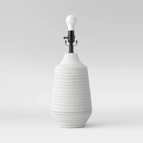 White ceramic lamp store base