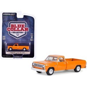 1982 Dodge Ram D-250 Pickup Truck DOT Orange "Blue Collar Collection" Series 13 1/64 Diecast Model Car by Greenlight - 1 of 3