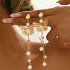 Paaaawaters 18K Gold-Plated Bow Earrings - Symmetrical Mirror-Finish Stainless Steel Jewelry, Hypoallergenic - 3 of 4