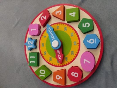 Melissa and doug hot sale shape sorter clock