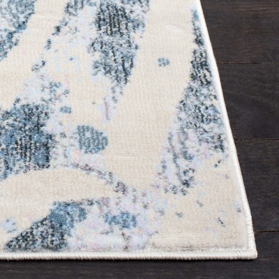 Blue and Green Floral Synthetic Area Rug 5'3" x 7'7"
