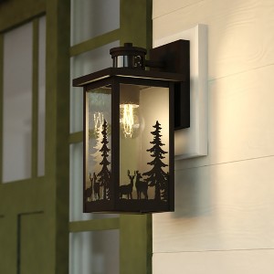 VAXCEL Acadia 12.25 in. H 1-Light Matte Black Rustic Wildlife Motion Sensor Dusk to Dawn Outdoor Wall Light, Durable Steel, Clear Seeded Glass Shade - 1 of 4