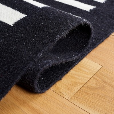 Handmade Black and Ivory Wool Striped 4' x 6' Area Rug