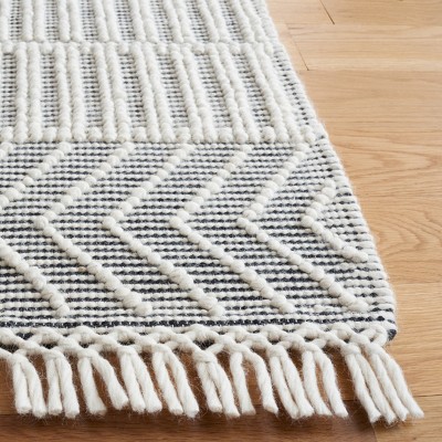 Handwoven Black and Ivory Wool 6' x 9' Area Rug