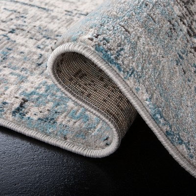 Abstract Blue Synthetic 59" Hand-Knotted Area Rug