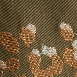 green animal embroidery