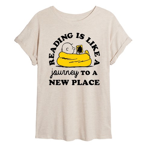 Women's - Peanuts - Charlie Reading Is Like A Journey Oversized Graphic T-Shirt - image 1 of 4