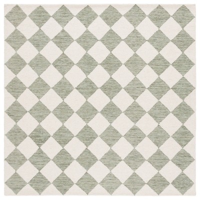 Ebony EBN120 Handmade Tufted Rug - Safavieh