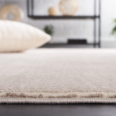 Elegant Beige Synthetic 31'' Rectangular Easy-Care Area Rug
