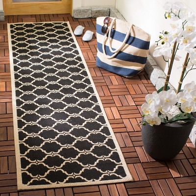 Courtyard Estelle 2'3" x 8' Black/Beige Synthetic Indoor/Outdoor Runner Rug
