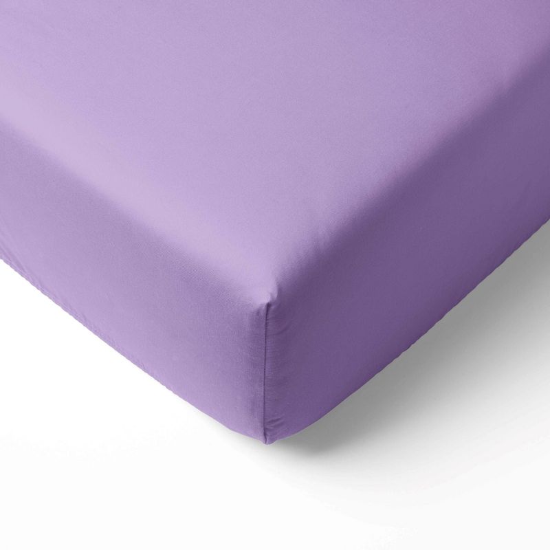 Bacati - Solid Lilac 100 percent Cotton Universal Baby US Standard Crib or Toddler Bed Fitted Sheet, 1 of 6