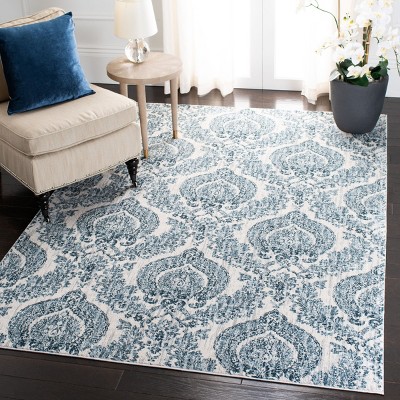 Navy and Ivory Floral Medallion Synthetic Area Rug, 5'3" x 7'7"