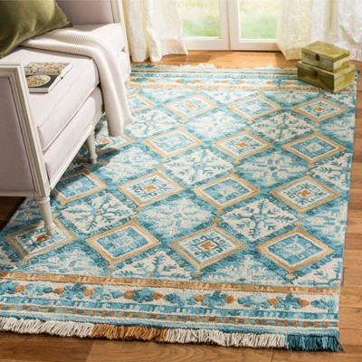 Handmade Ivory and Teal Wool Rectangular Area Rug, 5' x 8'