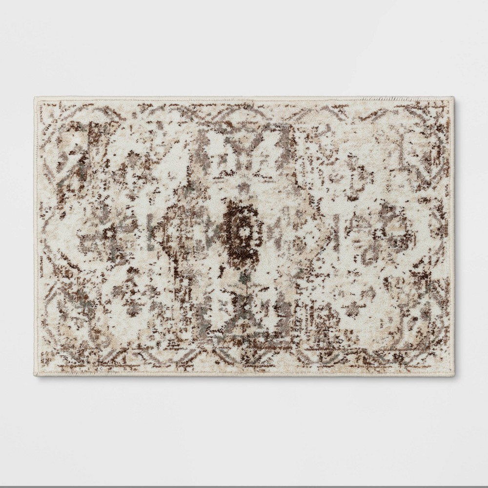  Companion Distressed Scroll Area Rug Cream